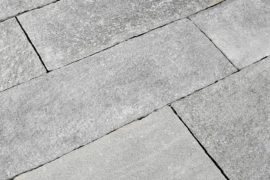 Gneis Terrassenplatte Torino 40 cm Bahnenware überwiegend grau